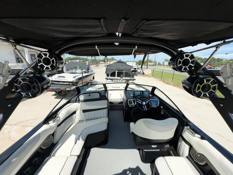 Slide: The Image of Interior of 2015 Malibu Wakesetter 24 MXZ boat with luxury seating and advanced audio system. - 27