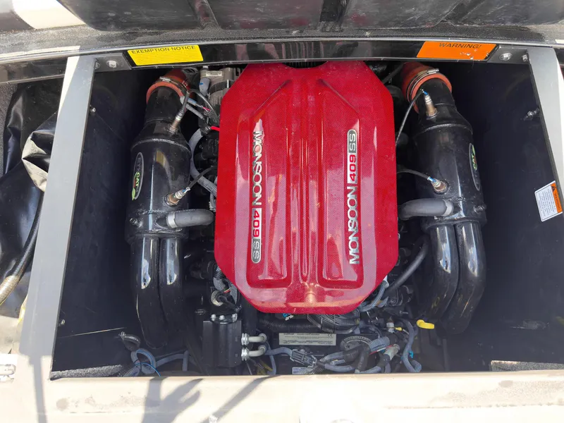 Slide: The Image of 2015 Malibu Wakesetter 24 MXZ engine, Monsoon 409 SS, red cover, detailed view. - 43