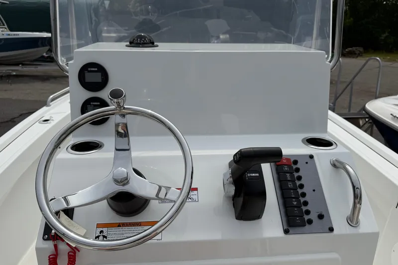 Slide: The Image of Steering console of 2025 Parker 181 SHOAL boat with Yamaha controls and gauges. - 10