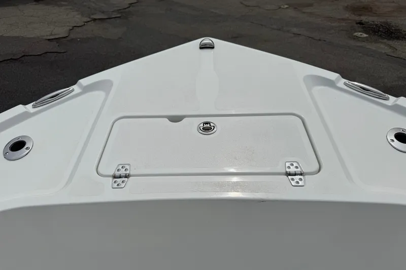 Slide: The Image of Bow of 2025 Parker 181 SHOAL boat with storage compartment and metal fittings. - 5