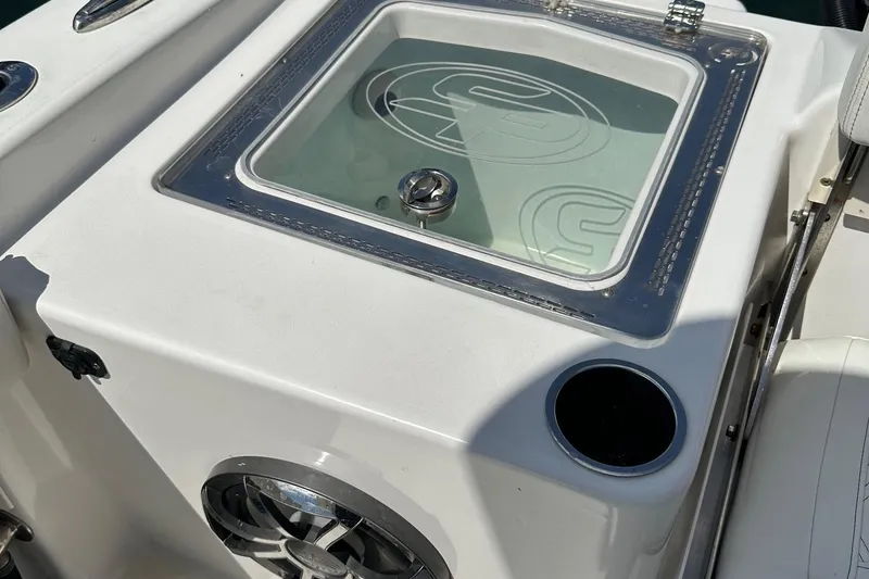 Slide: The Image of 2022 Sea Pro 320 DLX Center Console livewell and speaker detail. - 17