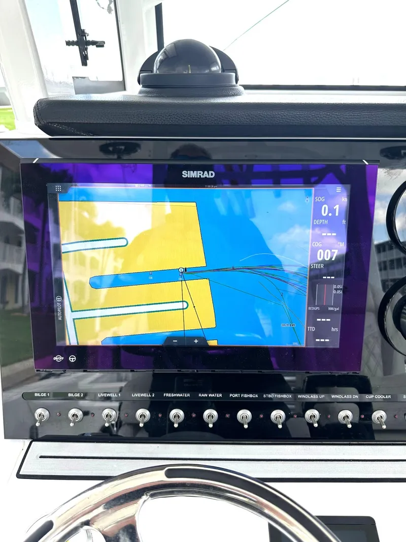 Slide: The Image of Simrad navigation display on 2022 Sea Pro 320 DLX Center Console boat. - 23
