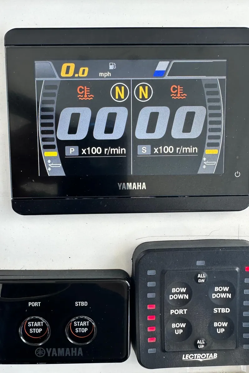 Slide: The Image of Yamaha marine display and controls on 2022 Sea Pro 320 DLX Center Console. - 35