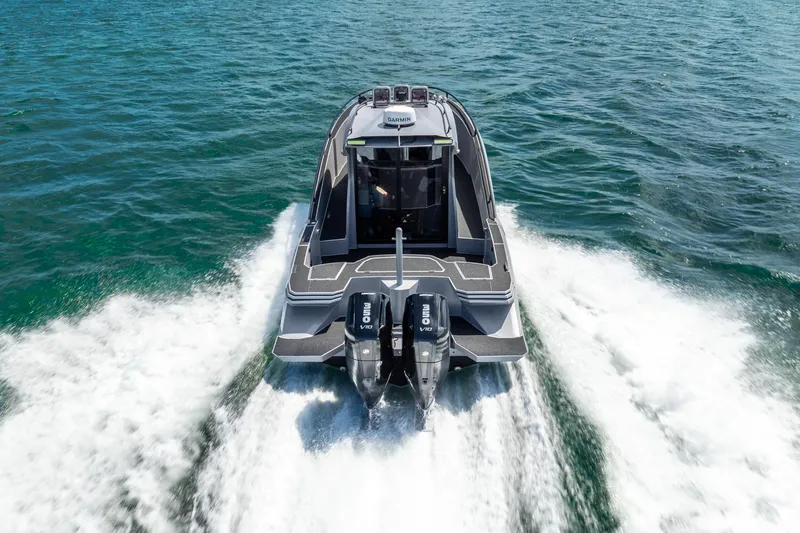 Slide: The Image of 2025 Novielli SERE boat cruising on open water, rear view. - 4