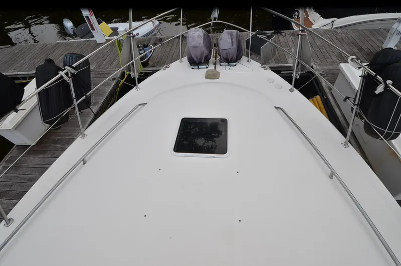 Slide: The Image of 2000 Sea Ray 420 Aft Cabin yacht deck view at dock. - 40