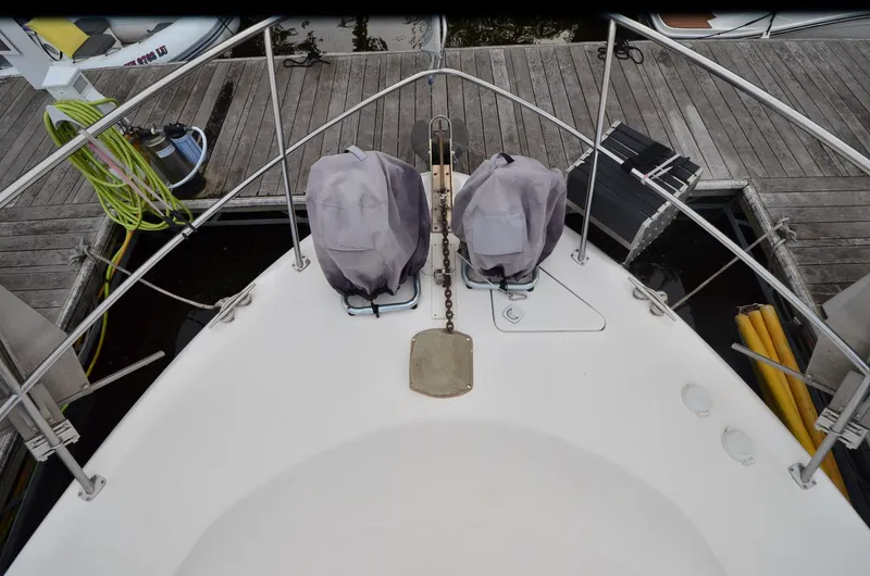 Slide: The Image of Bow view of 2000 Sea Ray 420 Aft Cabin docked at marina. - 41