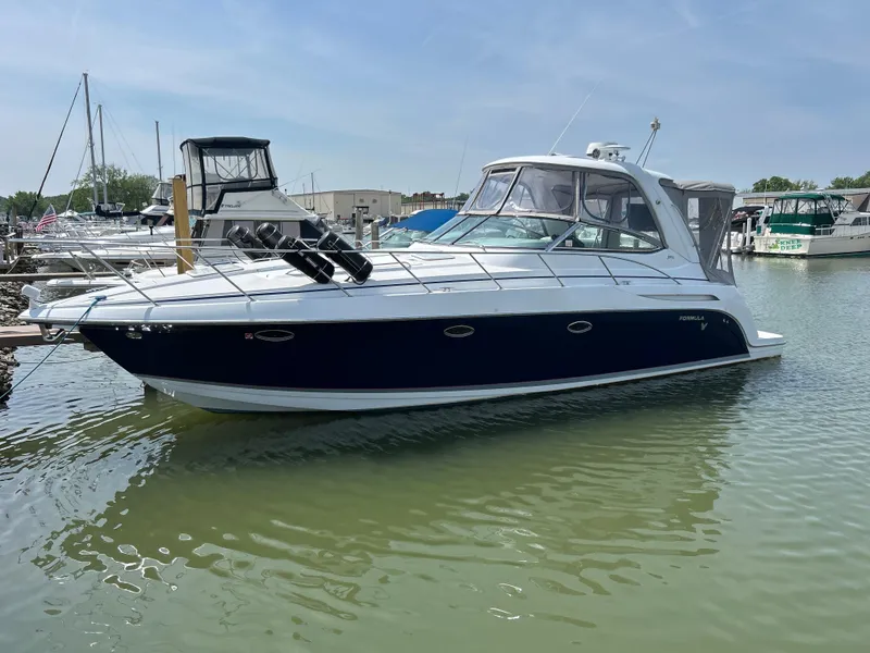 The Image of 2005 Formula 37 PC yacht docked in a marina, featuring sleek design and modern amenities. - 0
