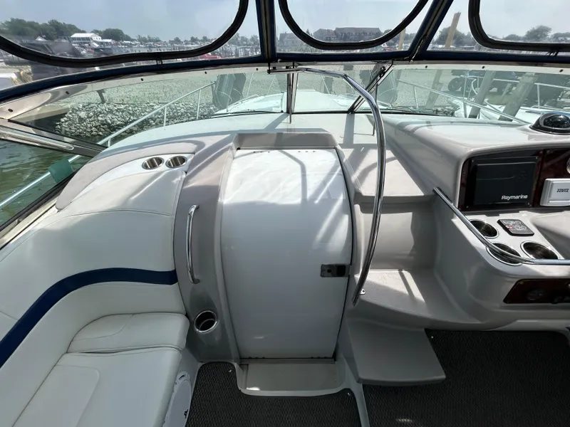 Slide: The Image of 2005 Formula 37 PC boat interior with helm, seating, and control panel. - 18