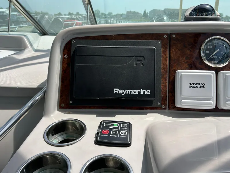 Slide: The Image of Dashboard of a 2005 Formula 37 PC boat with Raymarine and Volvo Penta controls. - 24