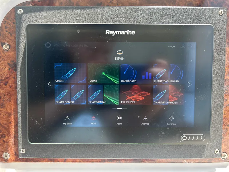Slide: The Image of Raymarine navigation display on 2005 Formula 37 PC boat, showing charts and radar options. - 25