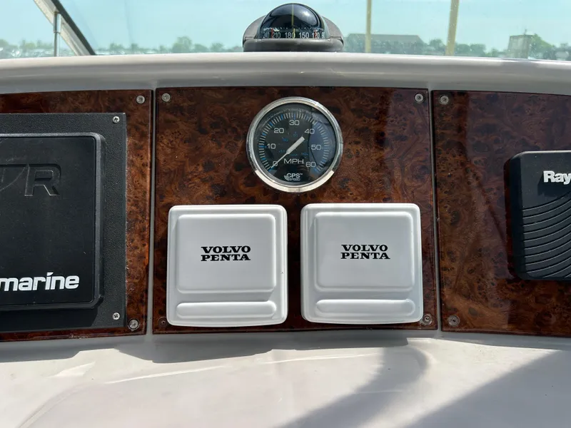 Slide: The Image of Dashboard of a 2005 Formula 37 PC boat with Volvo Penta controls. - 27