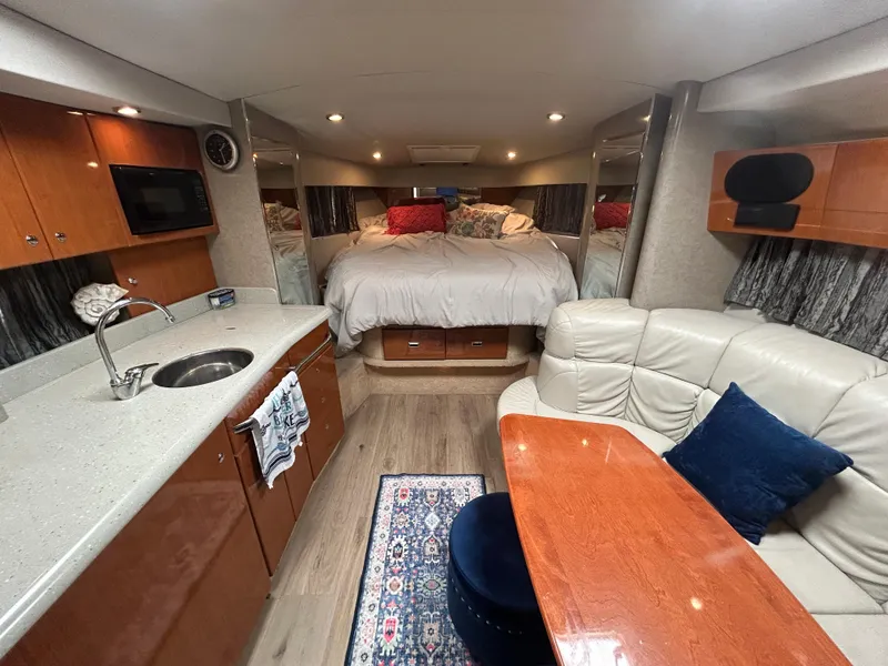 Slide: The Image of Luxurious interior of a 2005 Formula 37 PC yacht with cozy bed and kitchenette. - 36