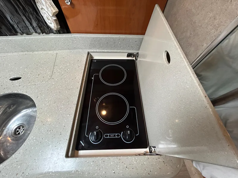 Slide: The Image of 2005 Formula 37 PC yacht kitchen with electric stove and sink. - 40