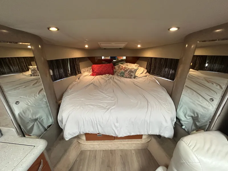 Slide: The Image of Luxurious cabin interior of a 2005 Formula 37 PC yacht with cozy bedding. - 43