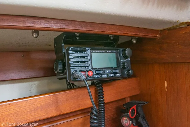 Slide: The Image of VHF radio installed on 1988 Catalina 36 sailboat, wooden interior. - 30