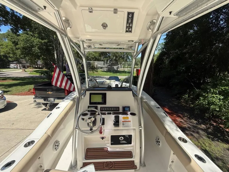 Slide: The Image of 2018 Sea Fox 248 Commander boat interior with steering wheel and control panel. - 4
