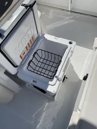 Slide: The Image of Open cooler on 2023 Sea Hunt Ultra 265 SE boat deck. - 18
