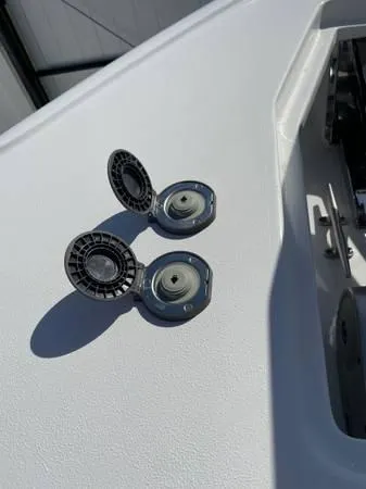 Slide: The Image of 2023 Sea Hunt Ultra 265 SE boat deck with open fuel caps. - 8