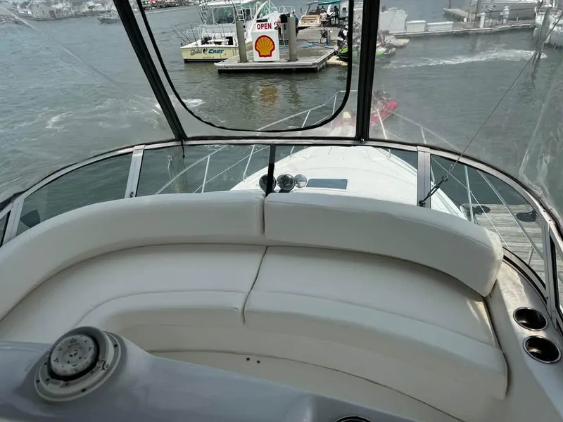 Slide: The Image of 2001 Silverton 351 Sedan Cruiser interior with marina view. - 14