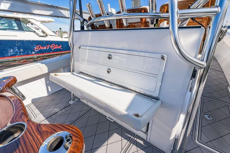 Slide: The Image of 2023 Front Runner 39 Center Console boat interior with seating and rod holders. - 25