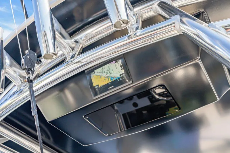 Slide: The Image of 2023 Front Runner 39 Center Console boat with advanced navigation display and sleek metal finish. - 27