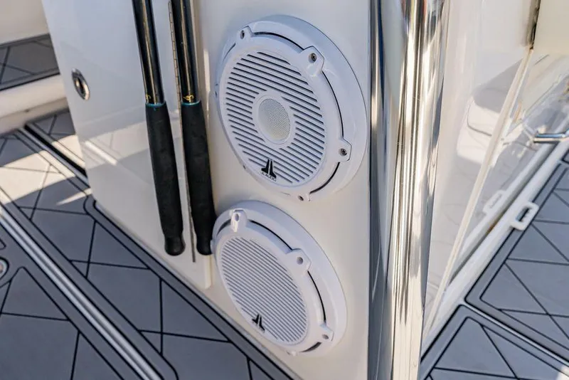 Slide: The Image of 2023 Front Runner 39 Center Console boat with speakers and fishing rod holders. - 30