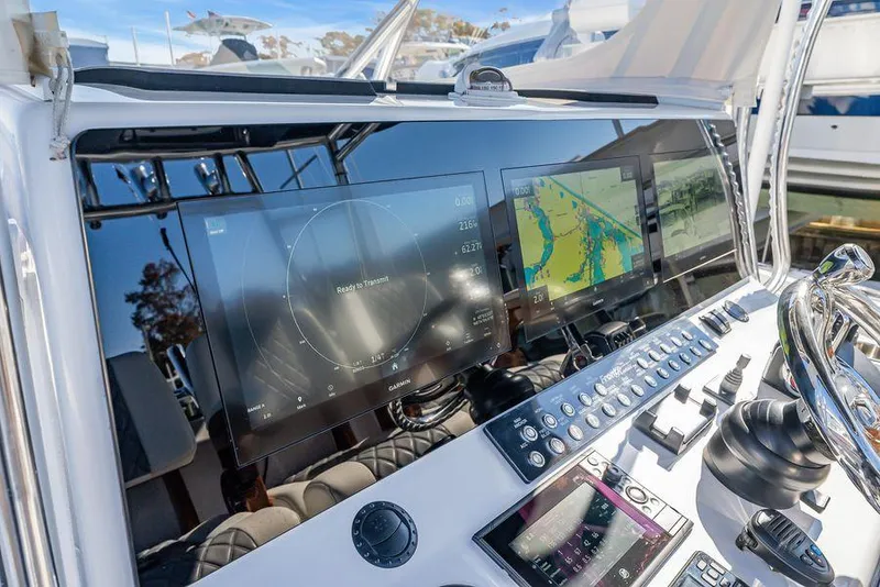 Slide: The Image of 2023 Front Runner 39 Center Console dashboard with advanced navigation displays and controls. - 32