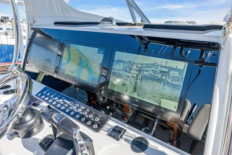 Slide: The Image of 2023 Front Runner 39 Center Console helm with advanced navigation displays. - 34