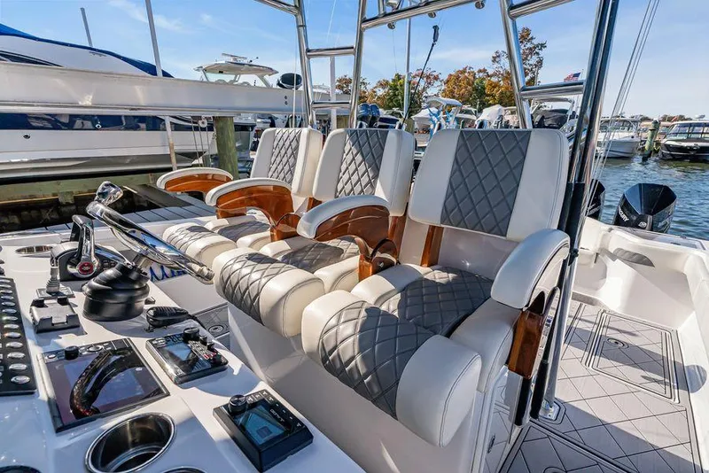 Slide: The Image of Luxurious seating on 2023 Front Runner 39 Center Console boat, featuring diamond-stitched upholstery. - 37