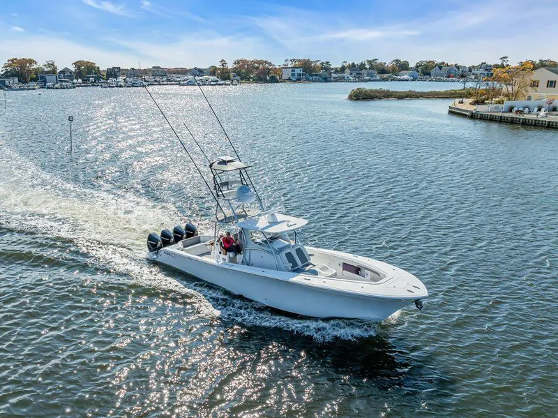 Slide: The Image of 2023 Front Runner 39 Center Console boat cruising on a sunny day. - 8