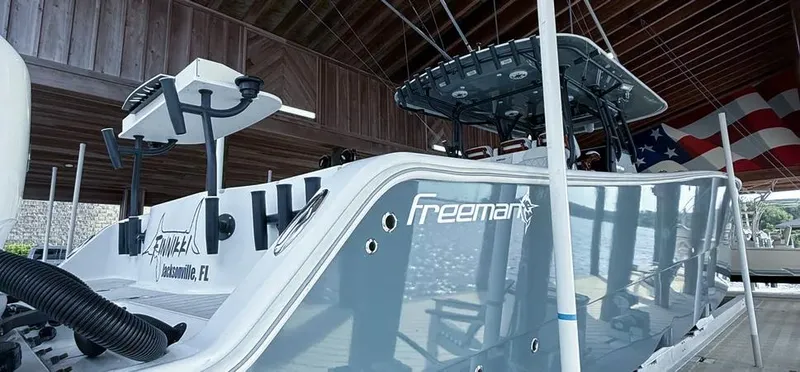 The Image of 2019 Freeman 42 LR boat docked under a wooden canopy, Jacksonville, FL. - 1