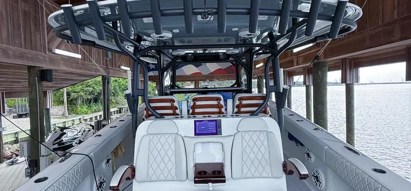 Slide: The Image of 2019 Freeman 42 LR boat interior with luxurious seating and advanced navigation system. - 16