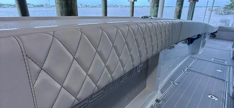 Slide: The Image of Luxurious interior of a 2019 Freeman 42 LR boat with diamond-stitched upholstery. - 19