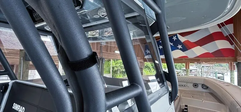 Slide: The Image of 2019 Freeman 42 LR boat interior with American flag backdrop. - 24