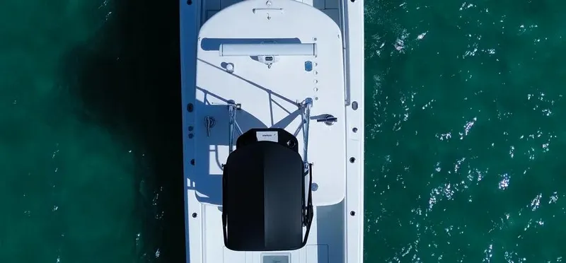 Slide: The Image of Aerial view of 2022 Contender 39 ST boat on turquoise water. - 10