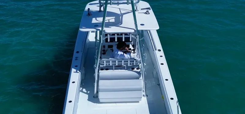 Slide: The Image of 2022 Contender 39 ST boat on clear blue water, aerial view. - 24