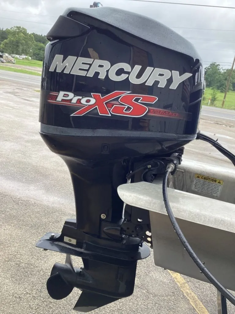Slide: The Image of Mercury Pro XS outboard motor on a 2016 Sun Tracker 22DLX. - 37