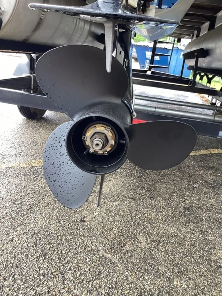Slide: The Image of Propeller of a 2016 Sun Tracker 22DLX on wet pavement. - 38