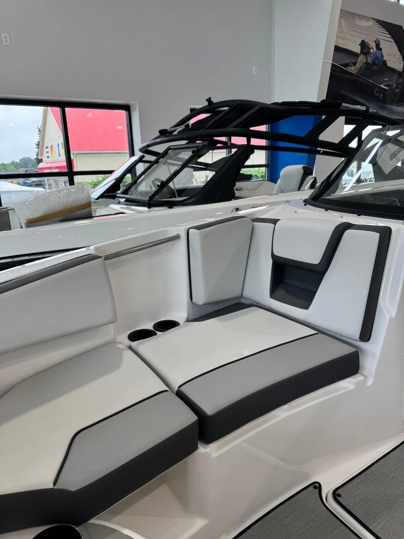 Slide: The Image of 2025 Yamaha Boats SX220 interior with sleek seating and modern design. - 10
