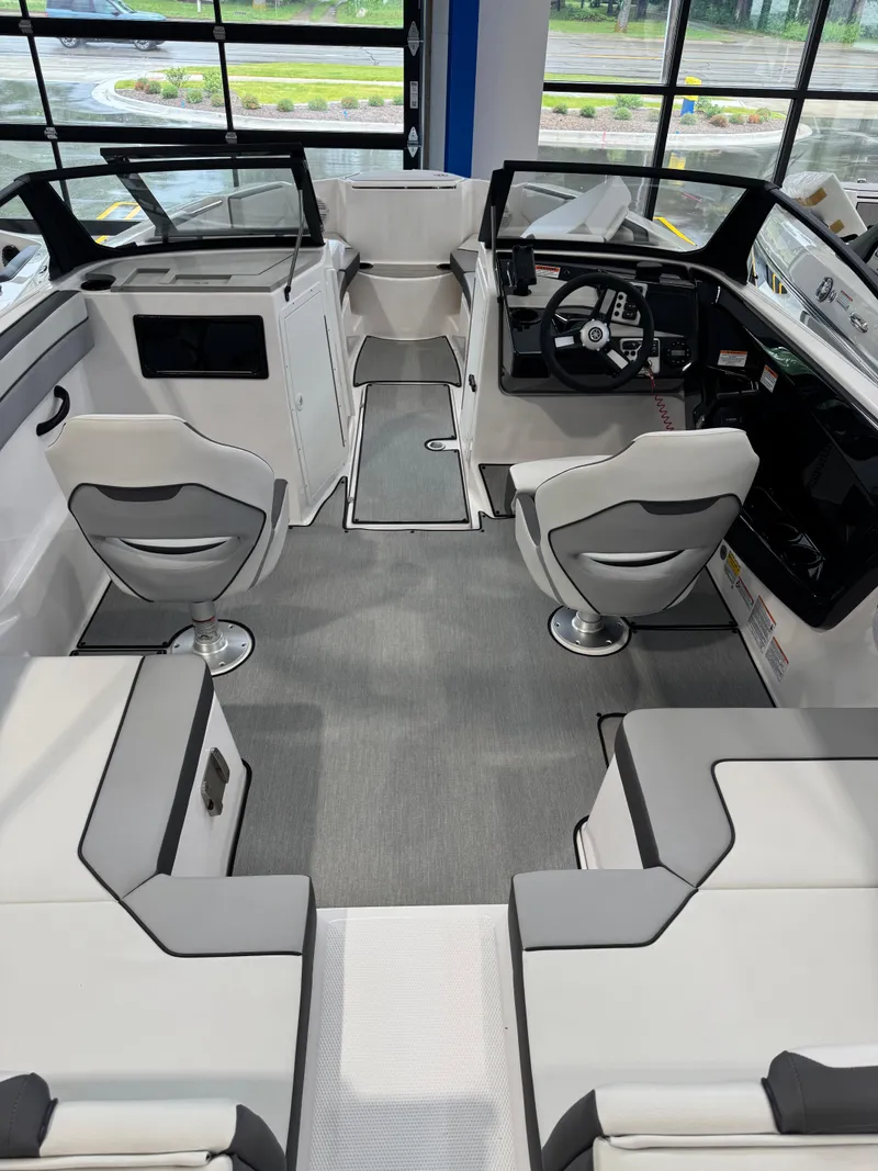 Slide: The Image of 2025 Yamaha Boats SX220 interior with modern seating and sleek design. - 3