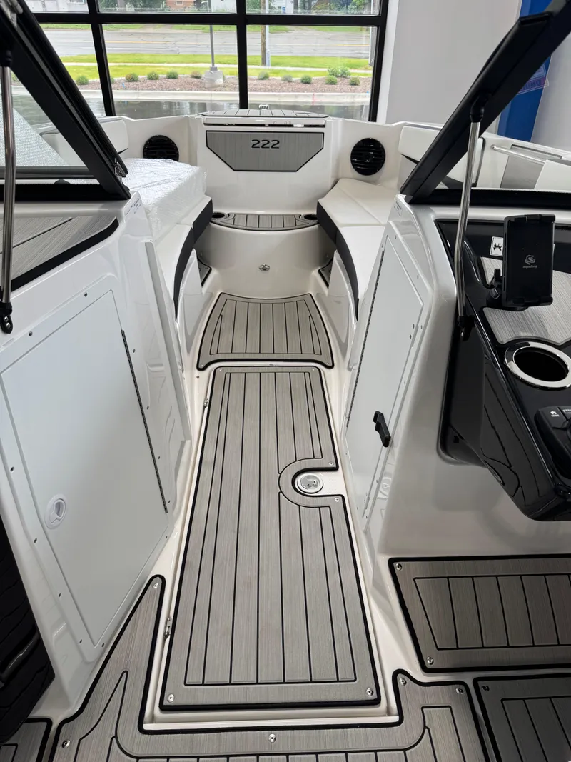 Slide: The Image of 2025 Yamaha Boats 222SD interior with sleek, modern design and spacious layout. - 10