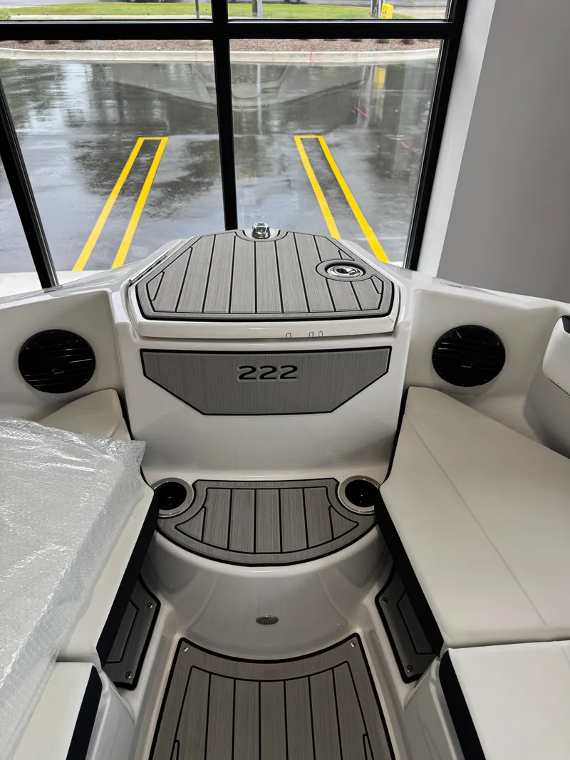 Slide: The Image of 2025 Yamaha Boats 222SD interior with sleek seating and modern design. - 12
