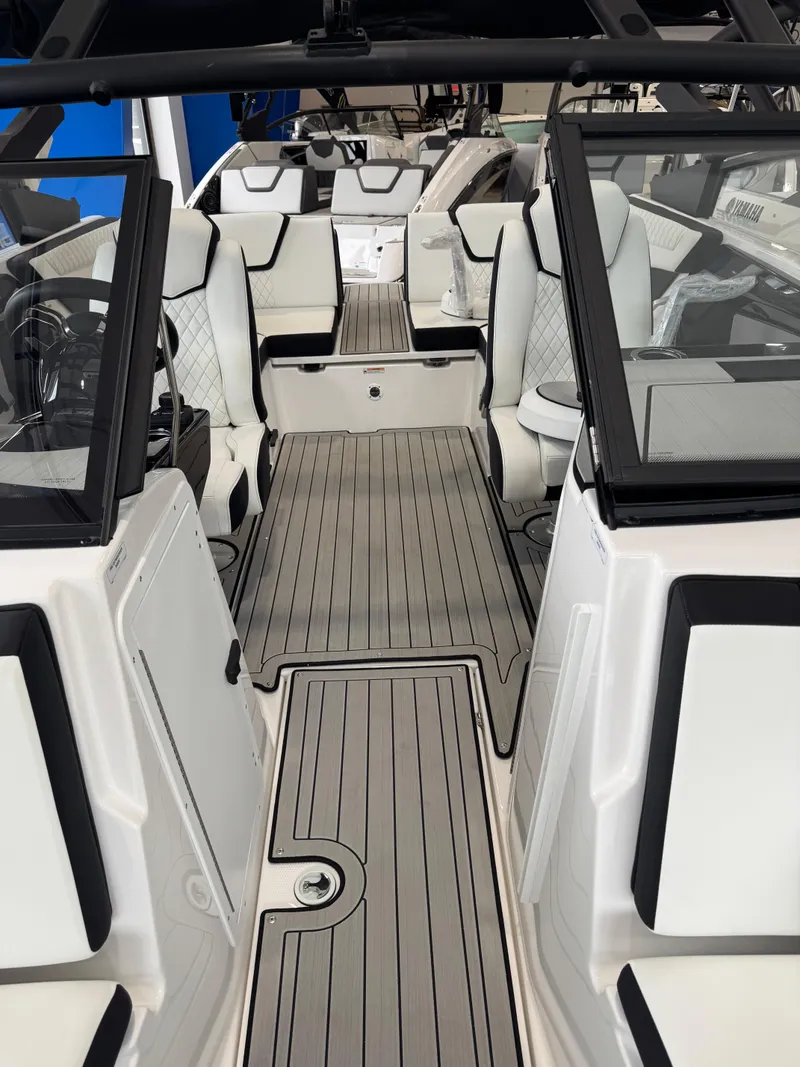 Slide: The Image of 2025 Yamaha Boats 222SD interior with sleek seating and modern design. - 14