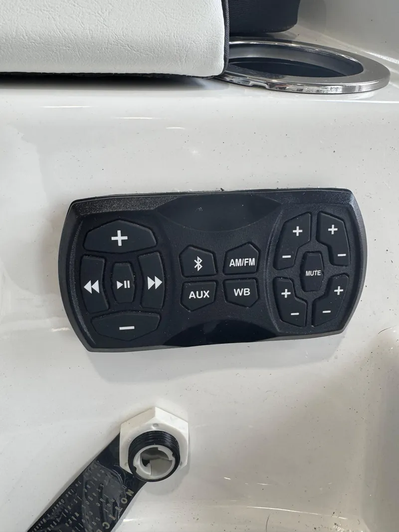 Slide: The Image of Audio control panel on 2025 Yamaha Boats 222SD, featuring Bluetooth, AM/FM, AUX, and WB options. - 4