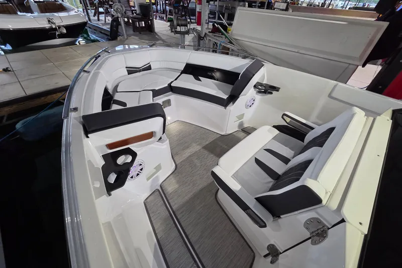 Slide: The Image of Luxurious interior of 2026 Monterey Elite 27 OB boat with stylish seating and modern design. - 19