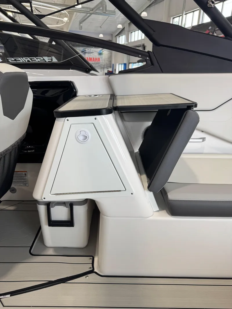 Slide: The Image of 2025 Yamaha Boats 252XE interior with sleek seating and modern design. - 10
