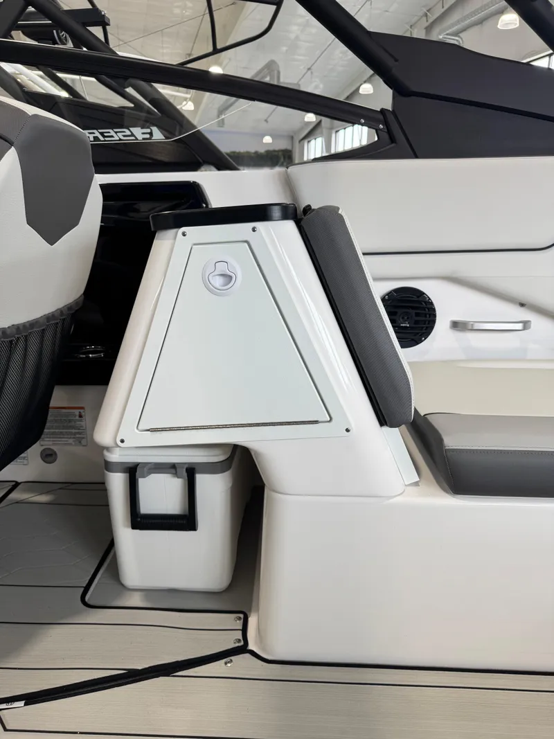 Slide: The Image of 2025 Yamaha Boats 252XE interior, featuring sleek seating and modern design elements. - 9