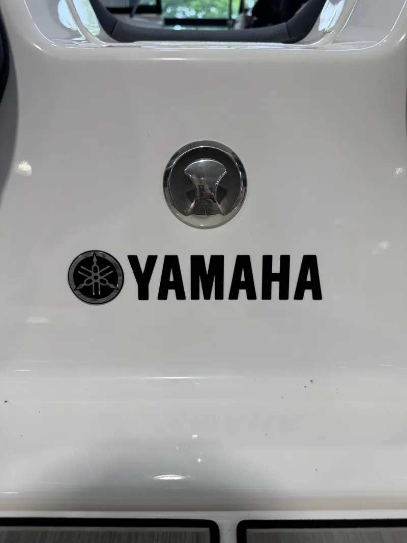Slide: The Image of 2025 Yamaha Boats 195S logo on white surface, featuring distinctive emblem. - 10