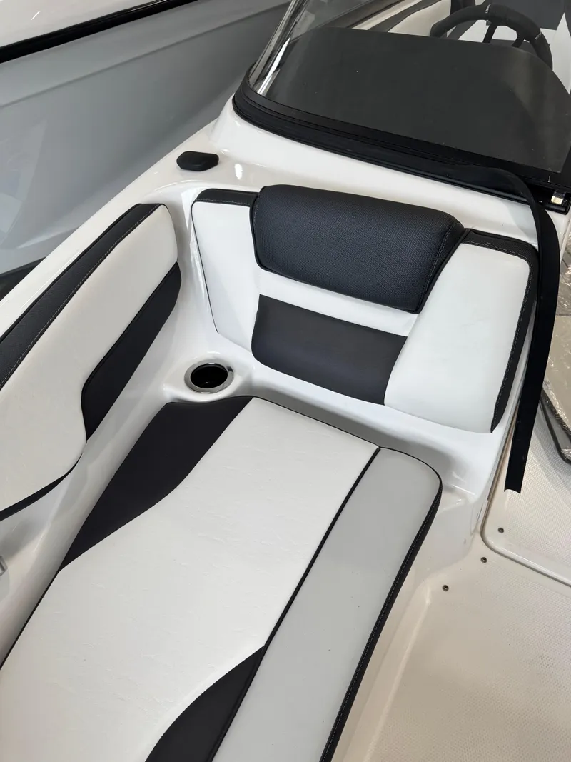 Slide: The Image of 2025 Yamaha Boats 195S interior seating with black and white upholstery. - 7