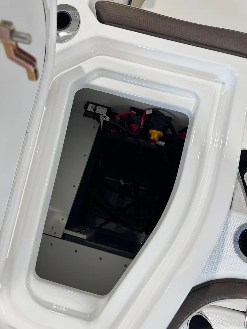 Slide: The Image of Open storage compartment in 2025 Yamaha Boats 255 FSH Sport E. - 6